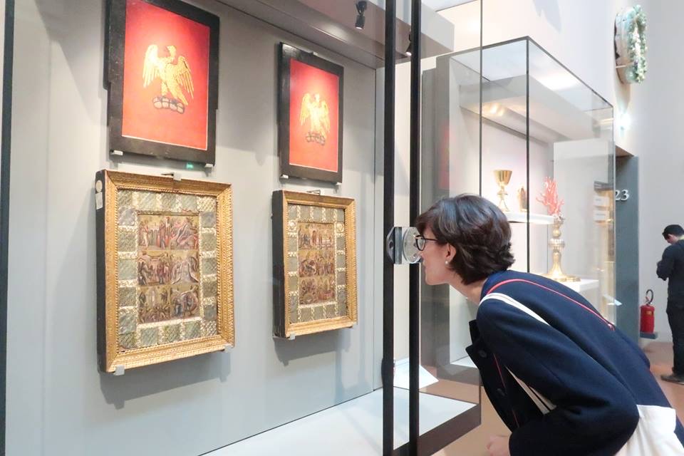 Dr. Sarah K. Kozlowski, Associate Director of The Edith O’Donnell Institute of Art History, studying a Byzantine micromosaic diptych at the Museo dell’Opera del Duomo in Florence.