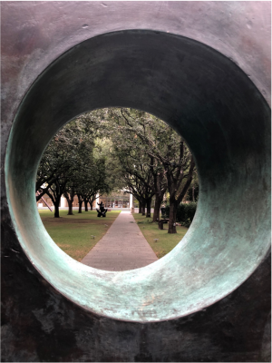 View through Barbara Hepworth, Squares with Two Circles (Monolith), 1963 (cast 1964), Bronze, Raymond and Patsy Nasher Collection; Nasher Sculpture Center, photograph Bonnie Pitman 2020